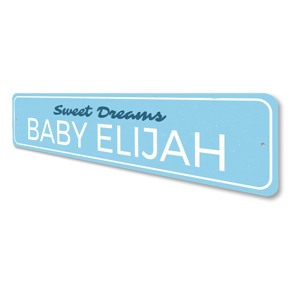 A personalized Sweet Dreams Baby Name Sign made of high-quality aluminum, featuring a child's name in a playful font, perfect for nursery decor.