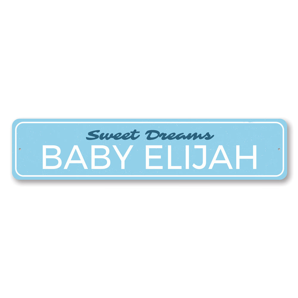 A personalized Sweet Dreams Baby Name Sign made of high-quality aluminum, featuring a child's name in a playful font, perfect for nursery decor.