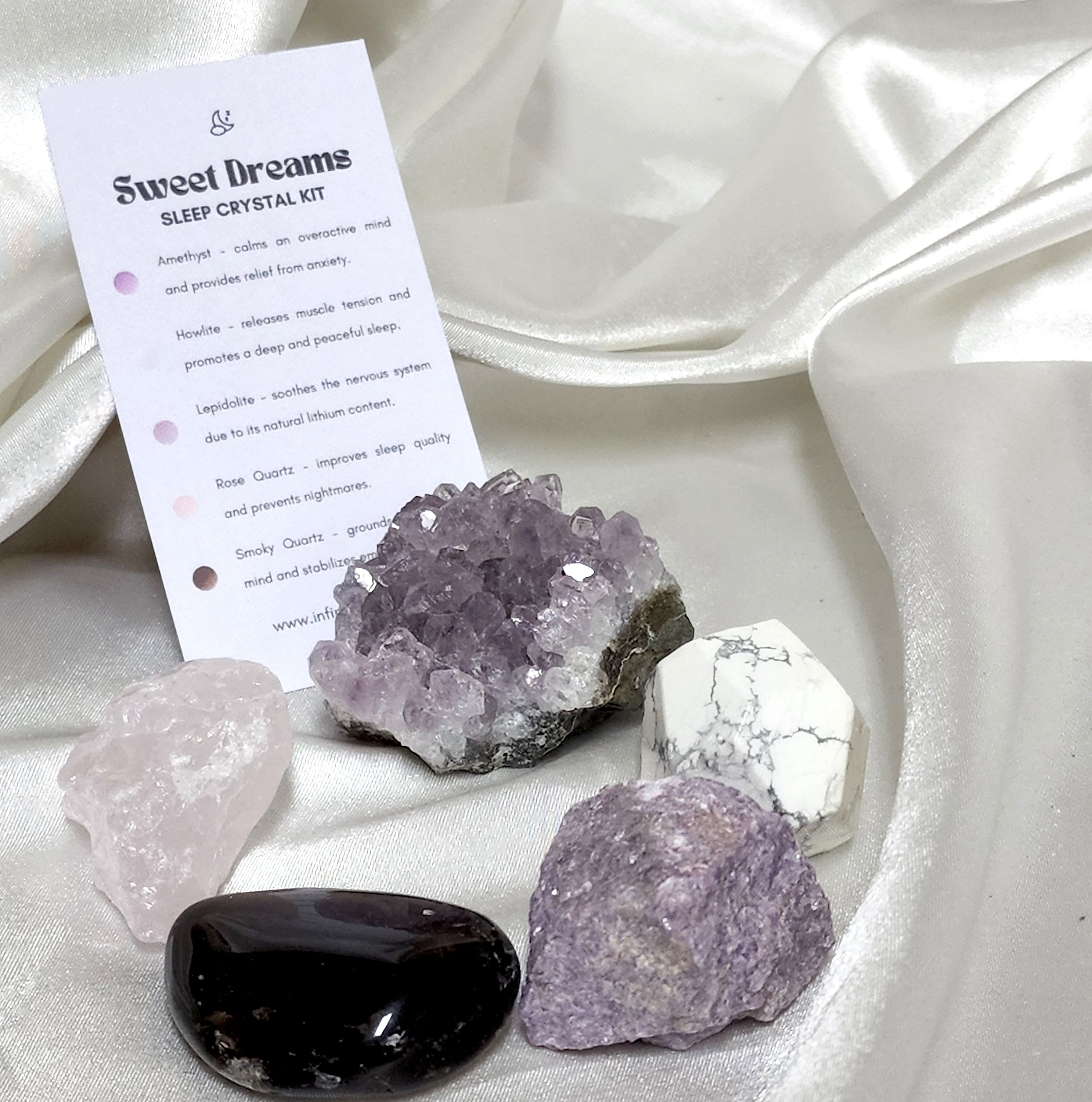 Sweet Dreams Sleep Crystal Kit featuring Howlite, Lepidolite, Rose Quartz, Amethyst, and Smoky Quartz, arranged on a soft surface.