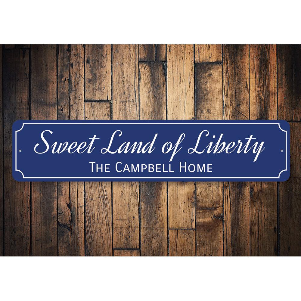 Sweet Land of Liberty Sign made from high-quality aluminum, featuring customizable text and pre-drilled holes for easy mounting.