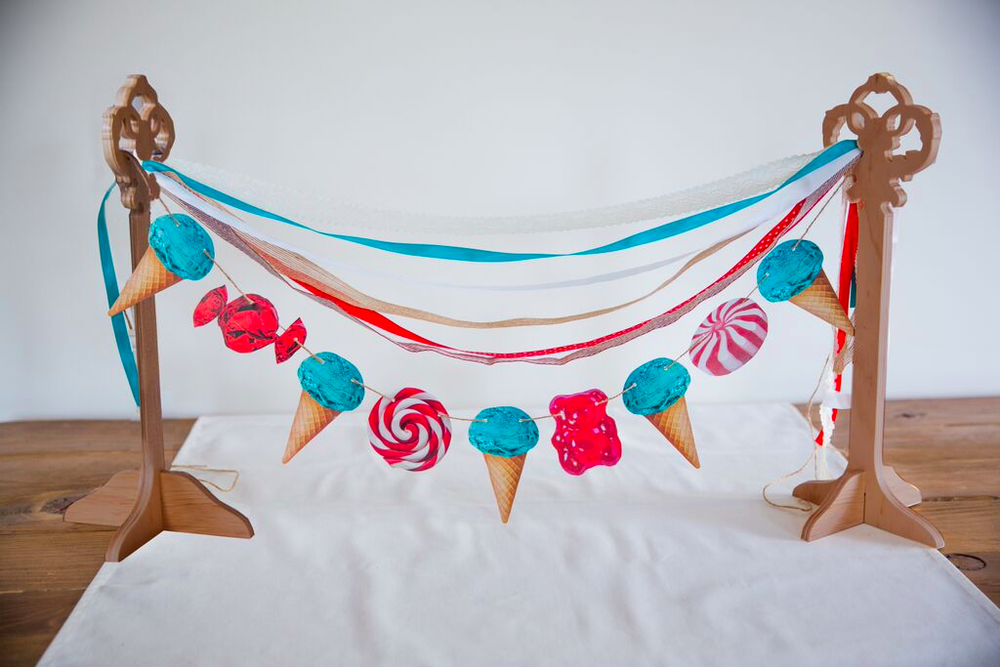 Colorful Sweets Garland featuring 15 feet of ribbon in three vibrant colors, perfect for festive decorations.