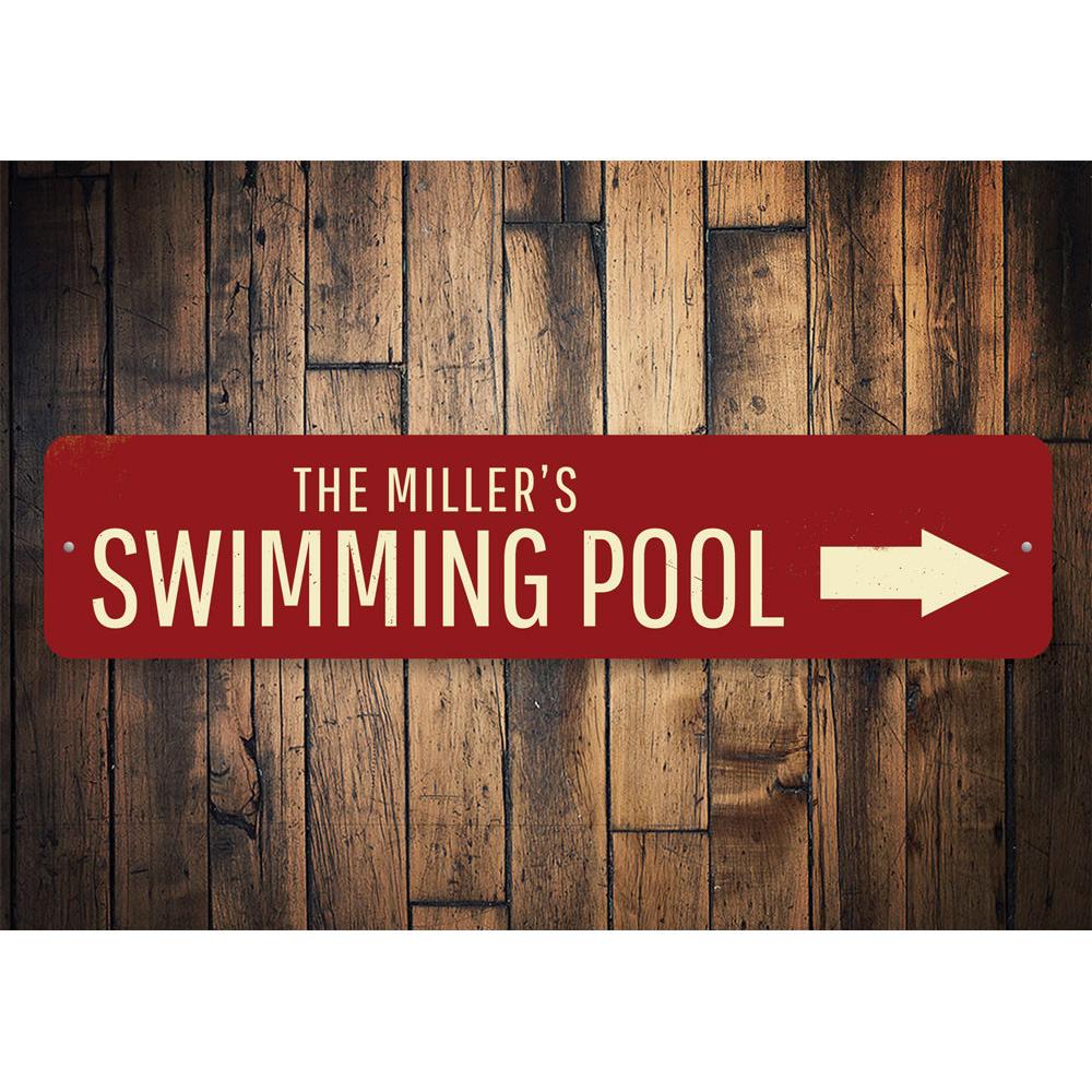 Swimming Pool Arrow Sign made of durable aluminum, featuring customizable text and pre-drilled holes for easy mounting.