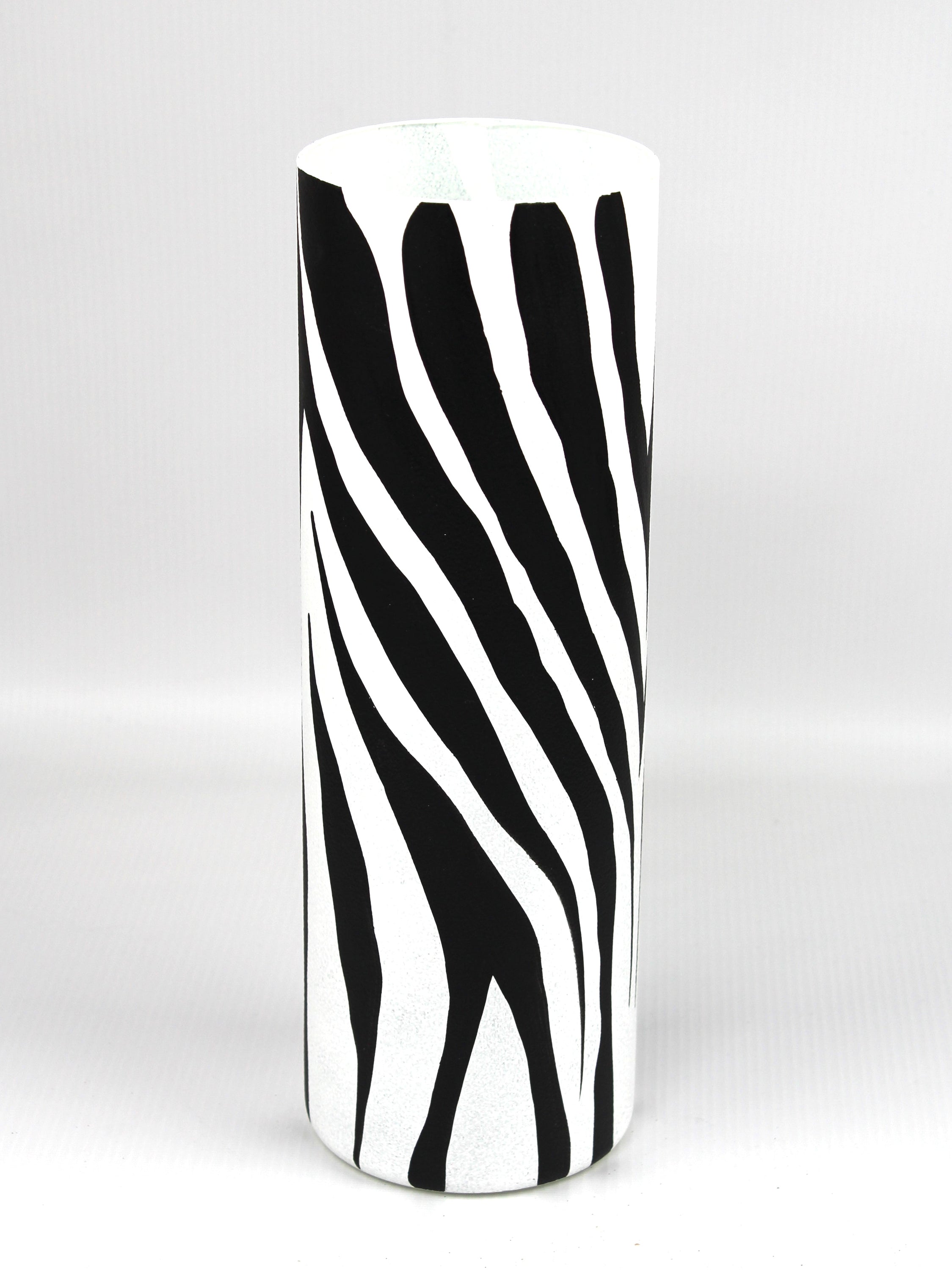 A beautifully hand-painted black and white decorative glass vase featuring unique artistic designs, perfect for home decor.