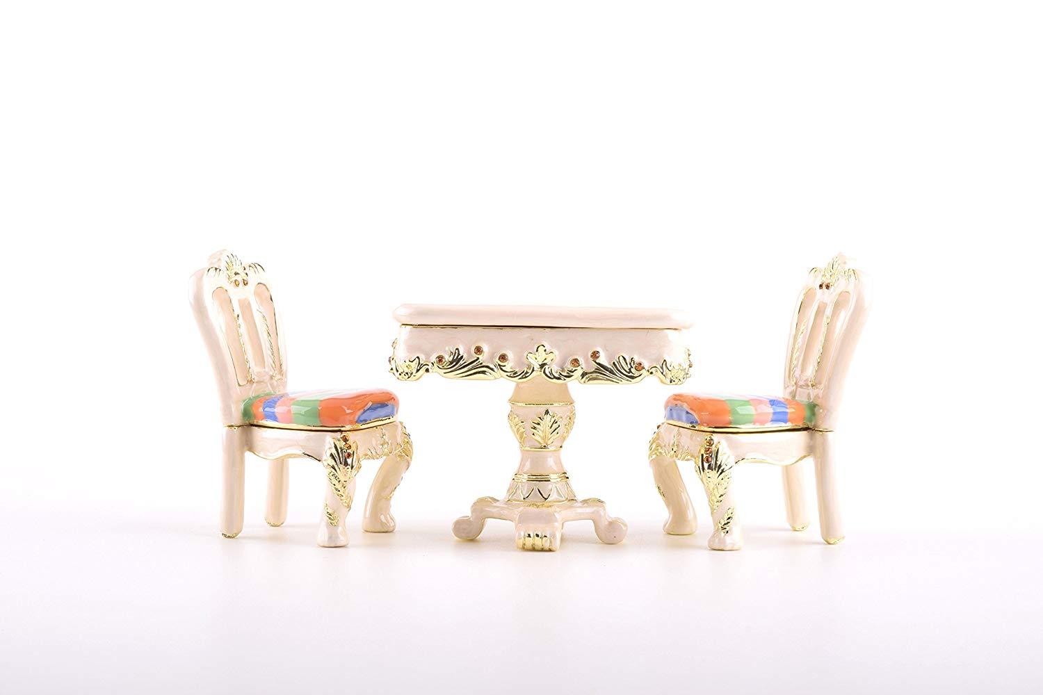 A beautifully handcrafted Table & Chairs trinket box adorned with Austrian crystals and plated with 24K Gold, showcasing intricate enamel painting.