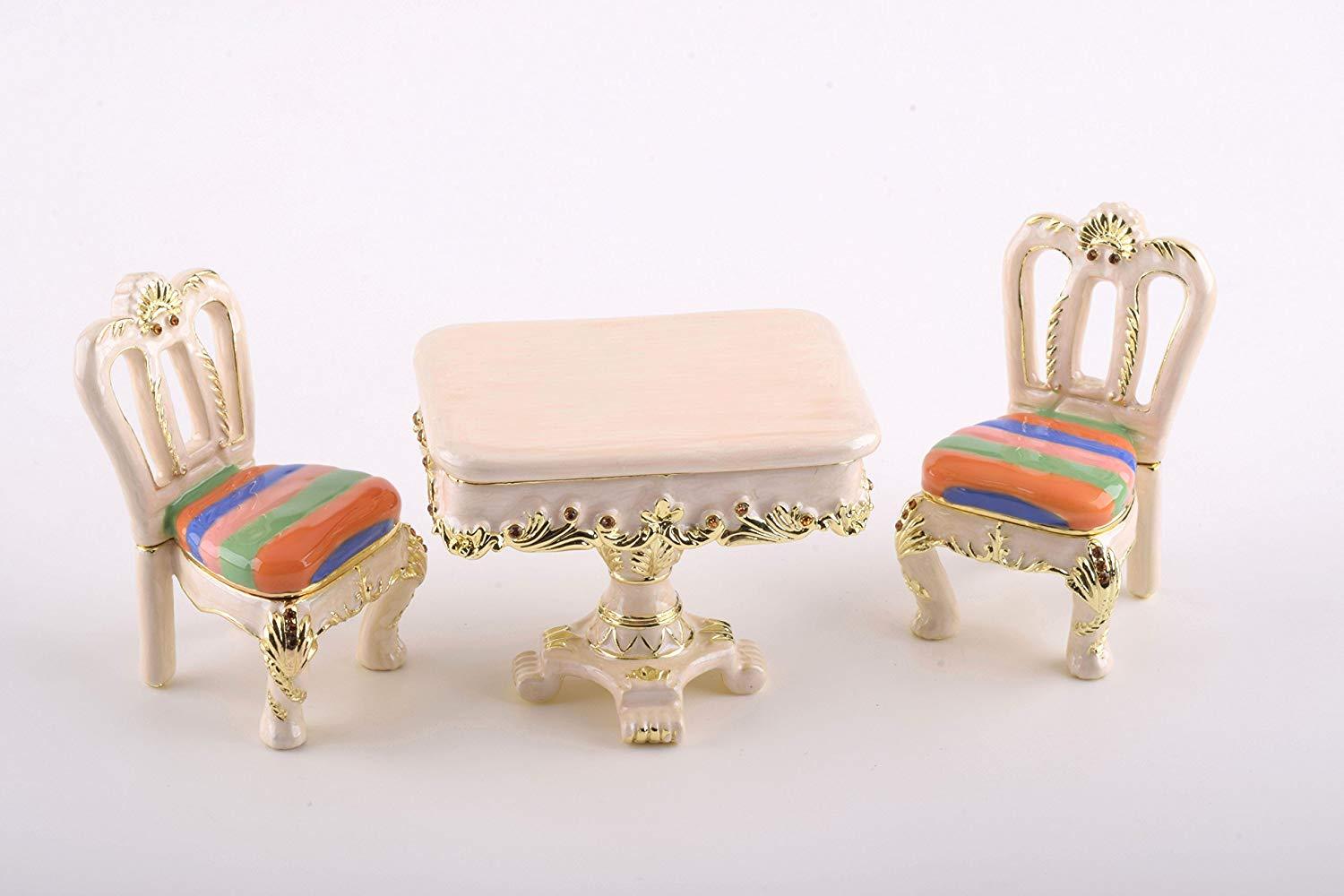 A beautifully handcrafted Table & Chairs trinket box adorned with Austrian crystals and plated with 24K Gold, showcasing intricate enamel painting.