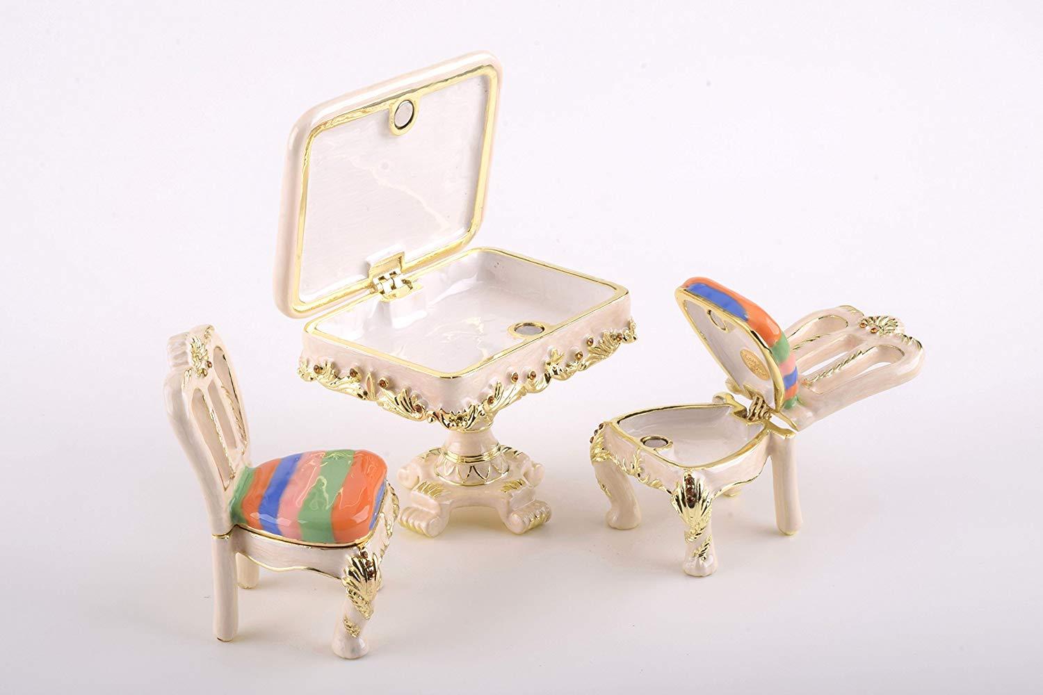 A beautifully handcrafted Table & Chairs trinket box adorned with Austrian crystals and plated with 24K Gold, showcasing intricate enamel painting.