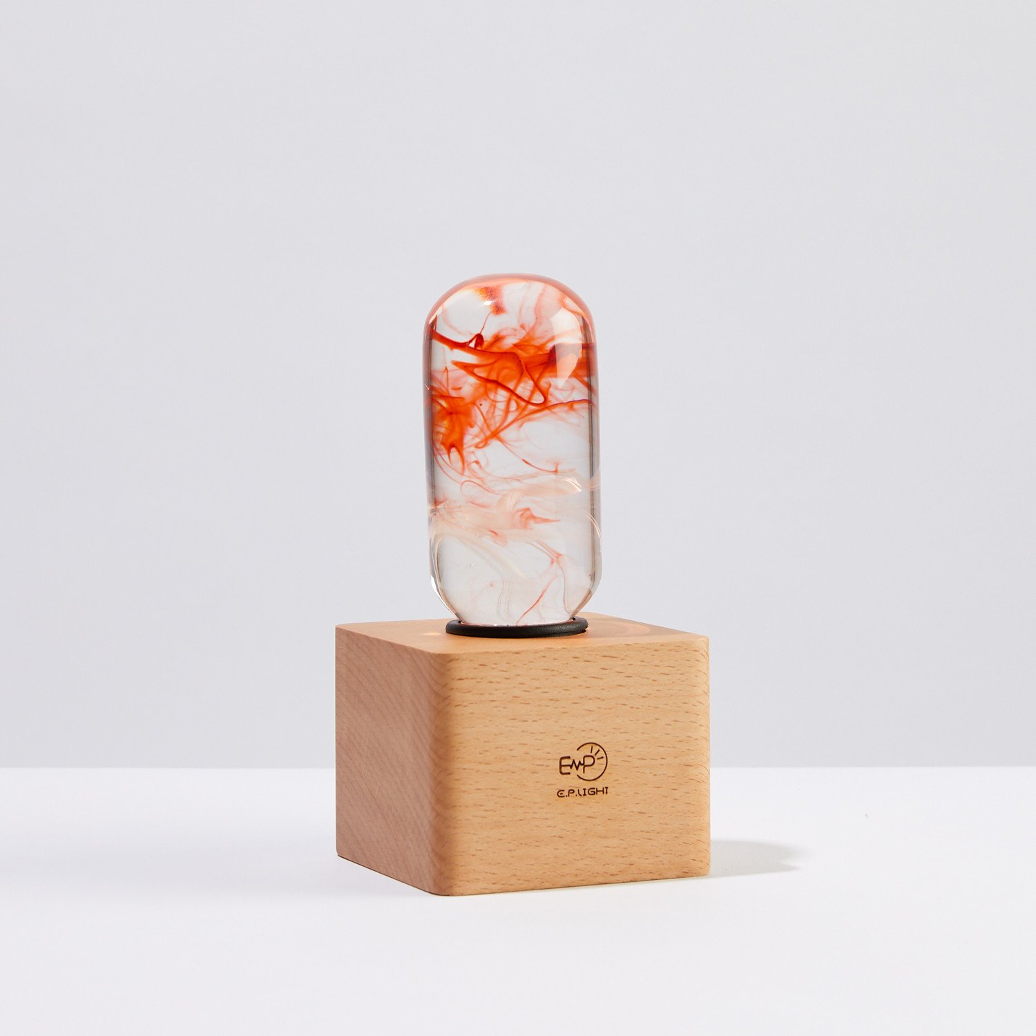 Tango Table Lamp featuring eco-friendly resin and beech wood, showcasing a stylish design with an LED bulb.