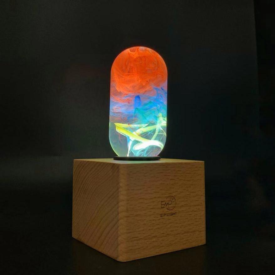 Youth Table Lamp featuring eco-friendly resin and beech wood, designed for vibrant illumination in youth rooms.