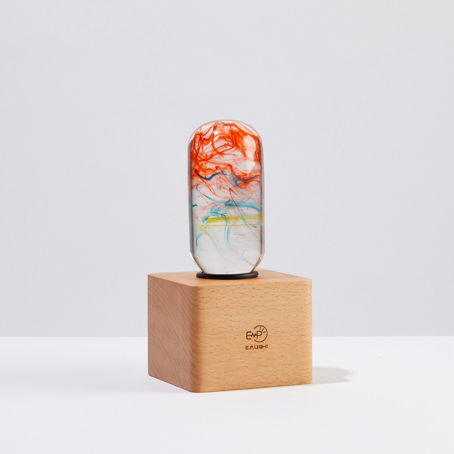 Youth Table Lamp featuring eco-friendly resin and beech wood, designed for vibrant illumination in youth rooms.