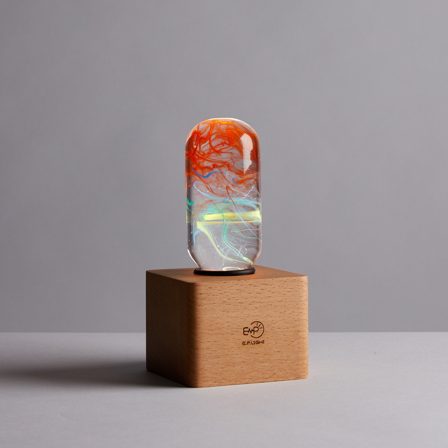 Youth Table Lamp featuring eco-friendly resin and beech wood, designed for vibrant illumination in youth rooms.