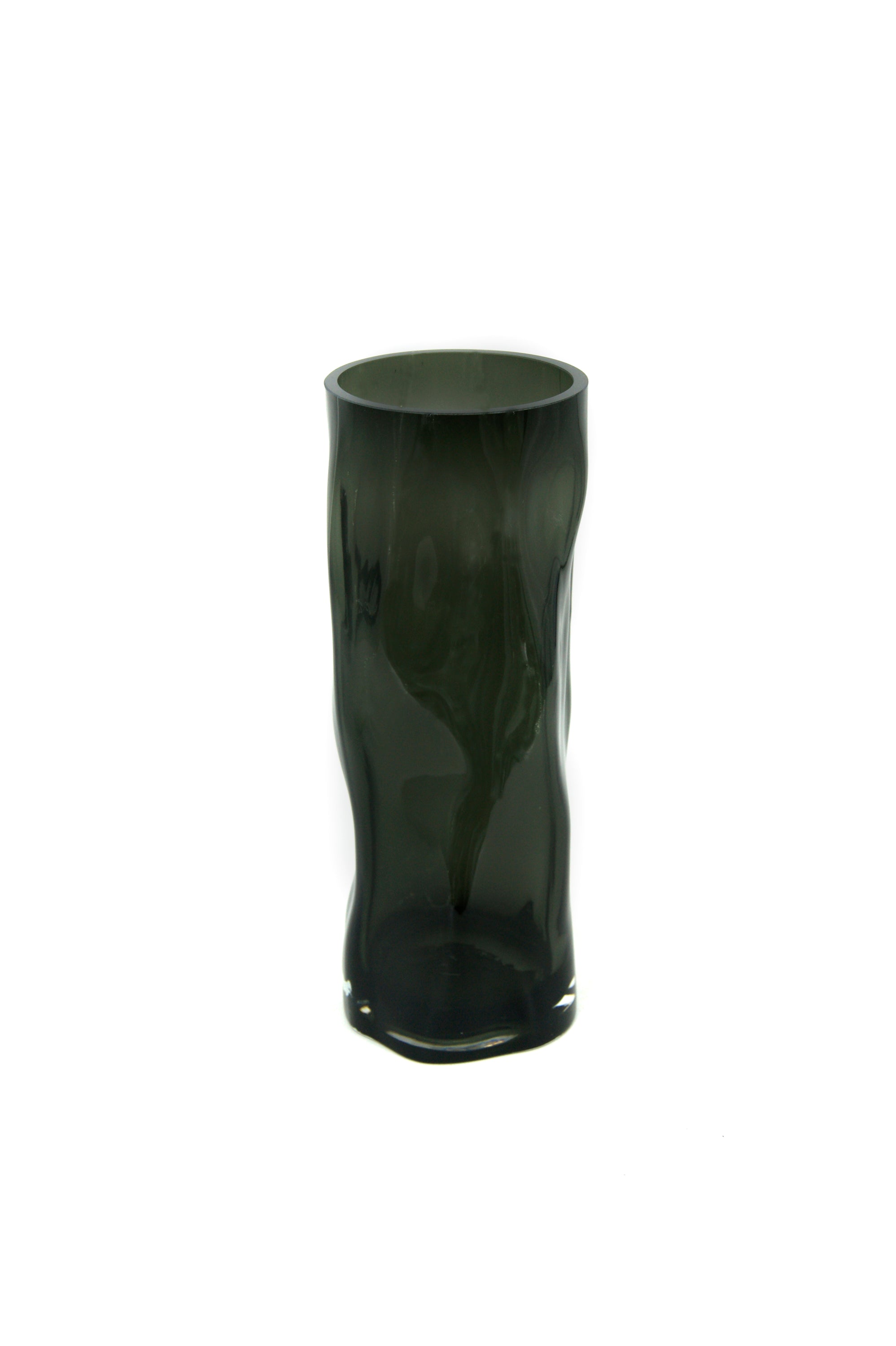 Tall cylindrical vase resembling black wood, made of thick glass with an irregular form, standing 40 cm tall.