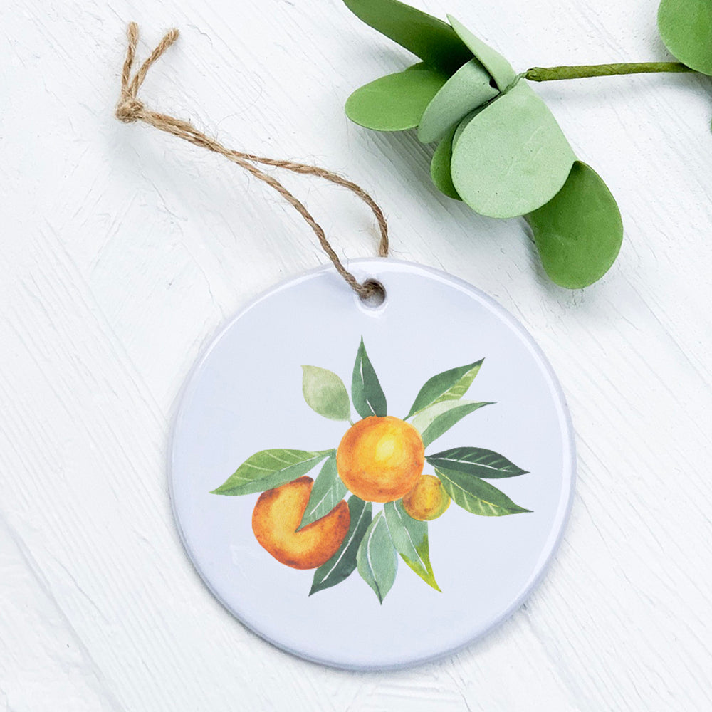 A beautifully crafted Tangerine Bunch porcelain ornament featuring vibrant colors and intricate designs, perfect for gifting or decoration.