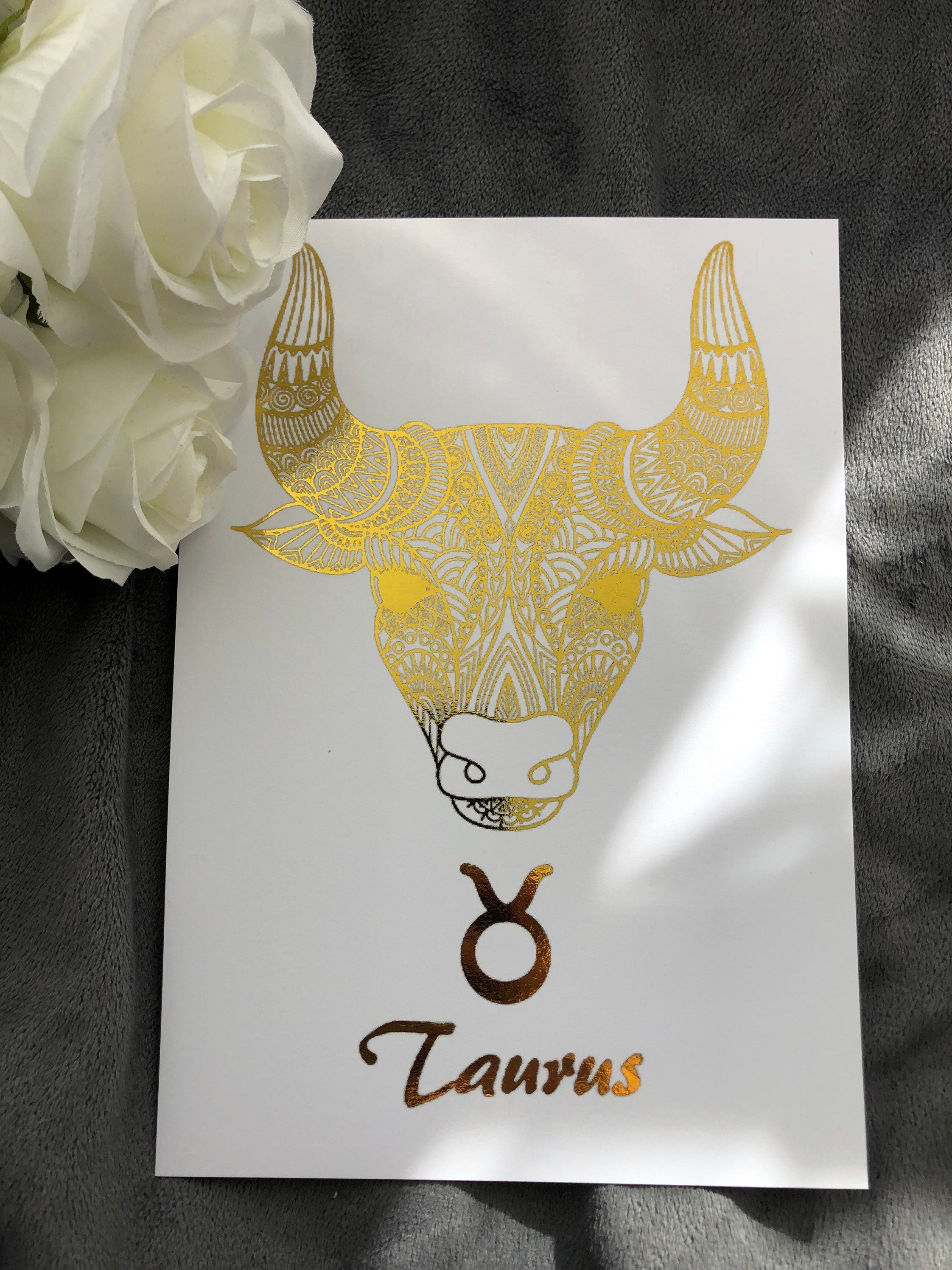 Taurus Star Sign Foil Print featuring a bull design with metallic accents, ideal for home decor.