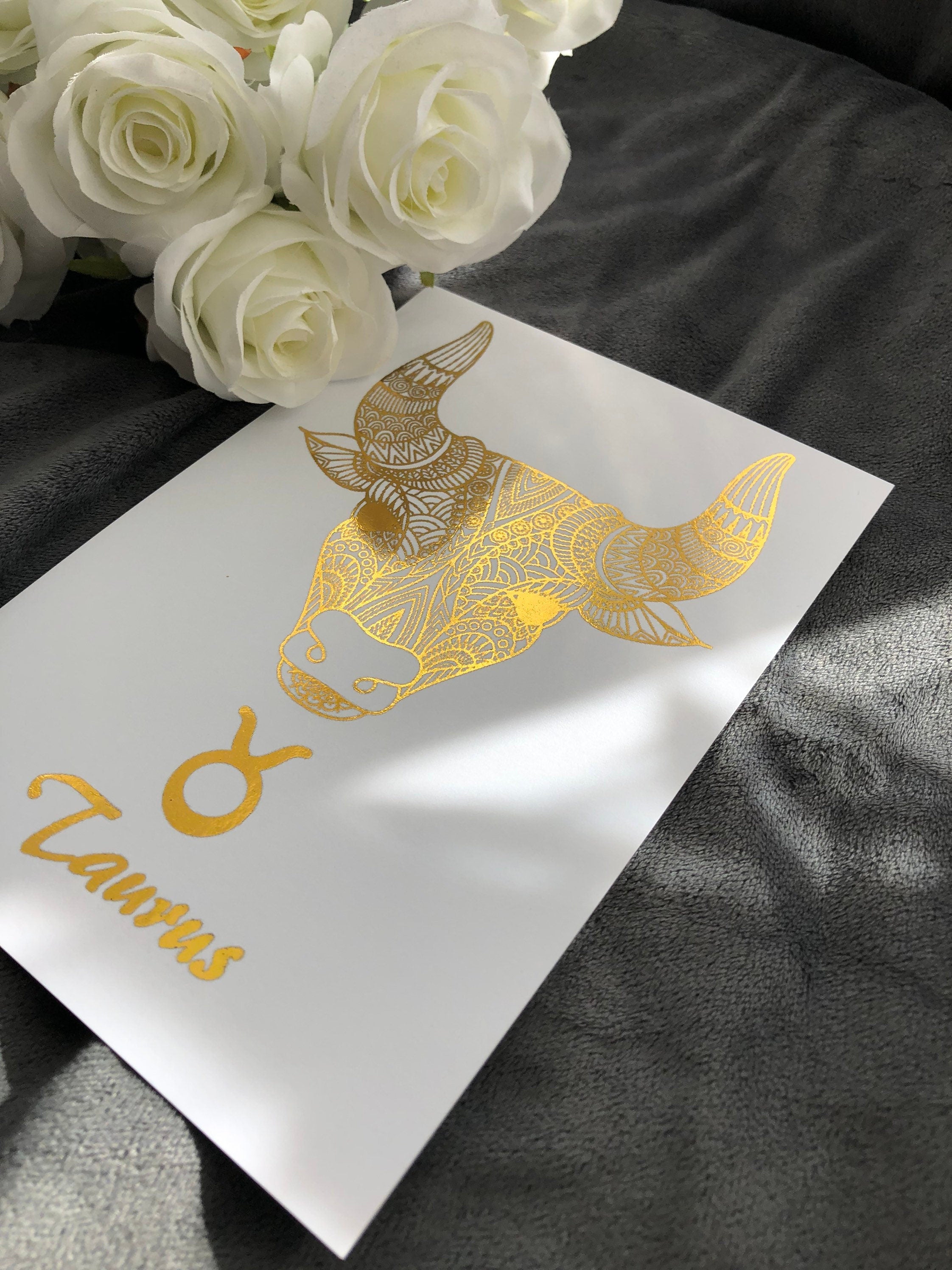 Taurus Star Sign Foil Print featuring a bull design with metallic accents, ideal for home decor.