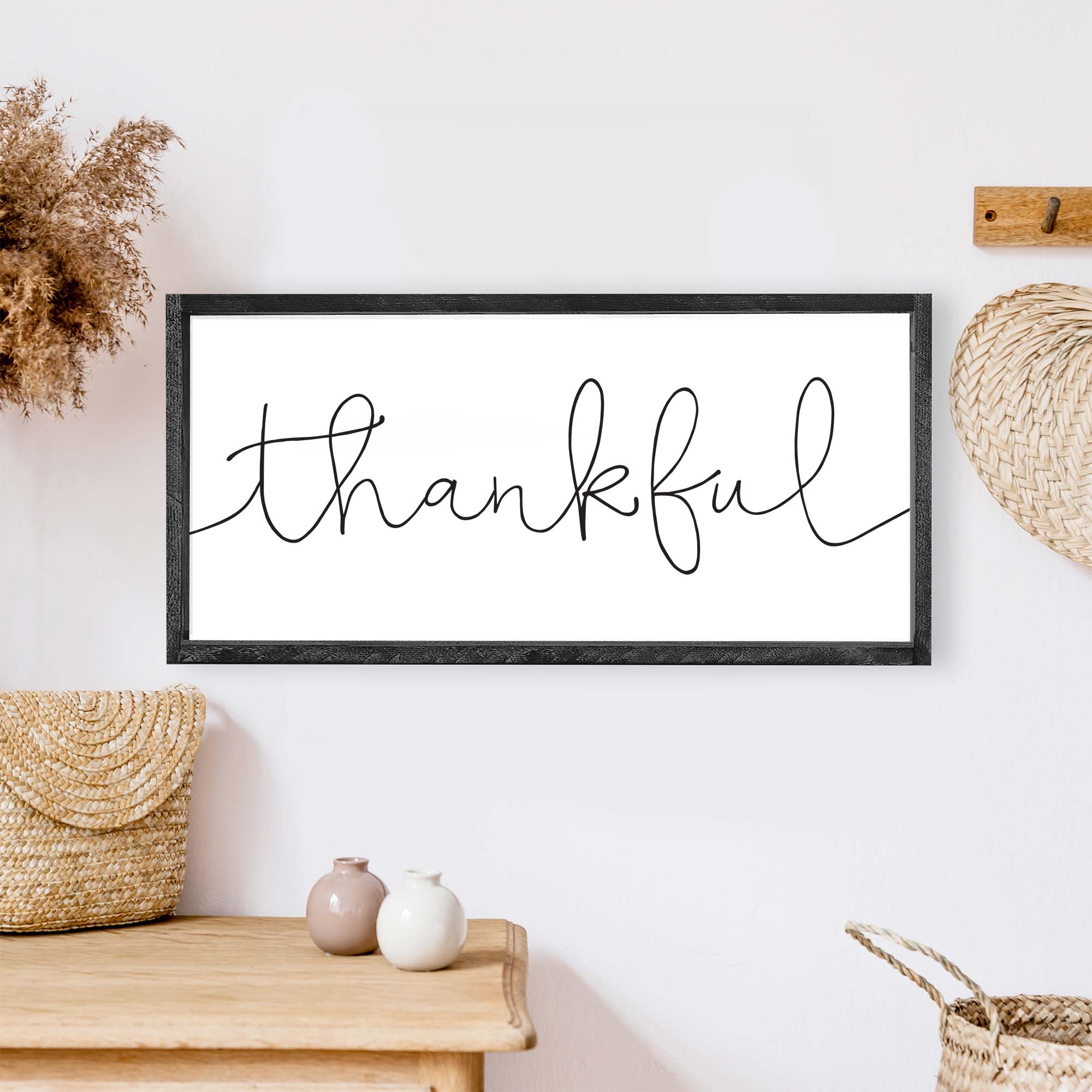 A rustic Thankful Wood Sign featuring a whimsical font on a white background, framed in stained pine wood, ideal for home decor.