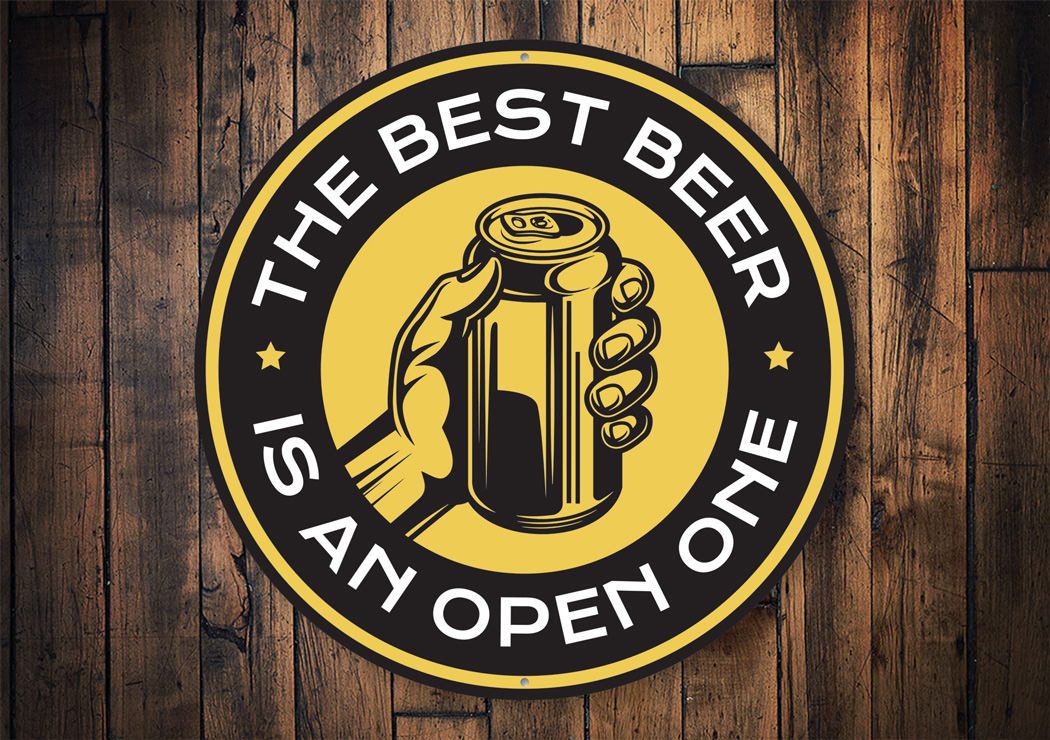 A humorous decorative sign reading 'The Best Beer is an Open One', made from high-quality aluminum, perfect for home decor.