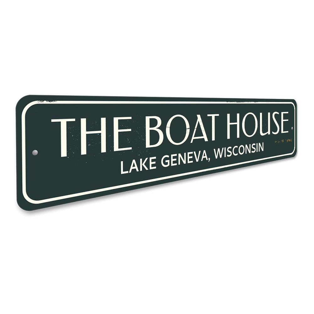 The Boat House Sign made of high-quality aluminum, featuring customizable text and a beautiful lake-themed design, perfect for lakehouses.