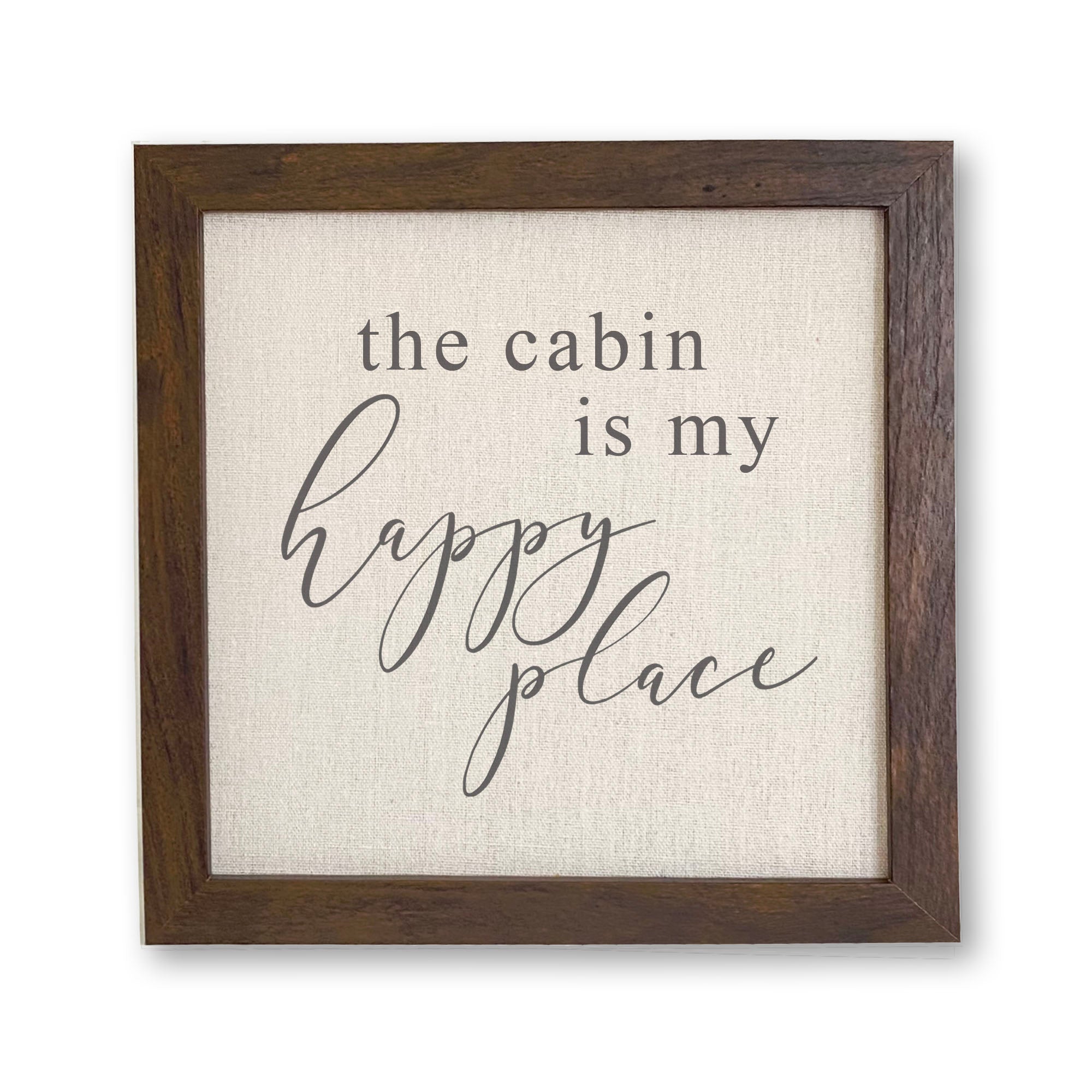 Framed sign reading 'The Cabin is my Happy Place' with a stylish wood frame and linen-look background.