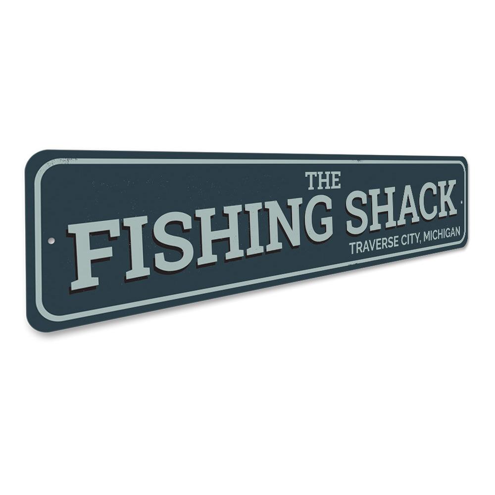 The Fishing Shack Sign, a customizable aluminum decorative sign featuring lake-themed design, perfect for lakehouses and outdoor decor.