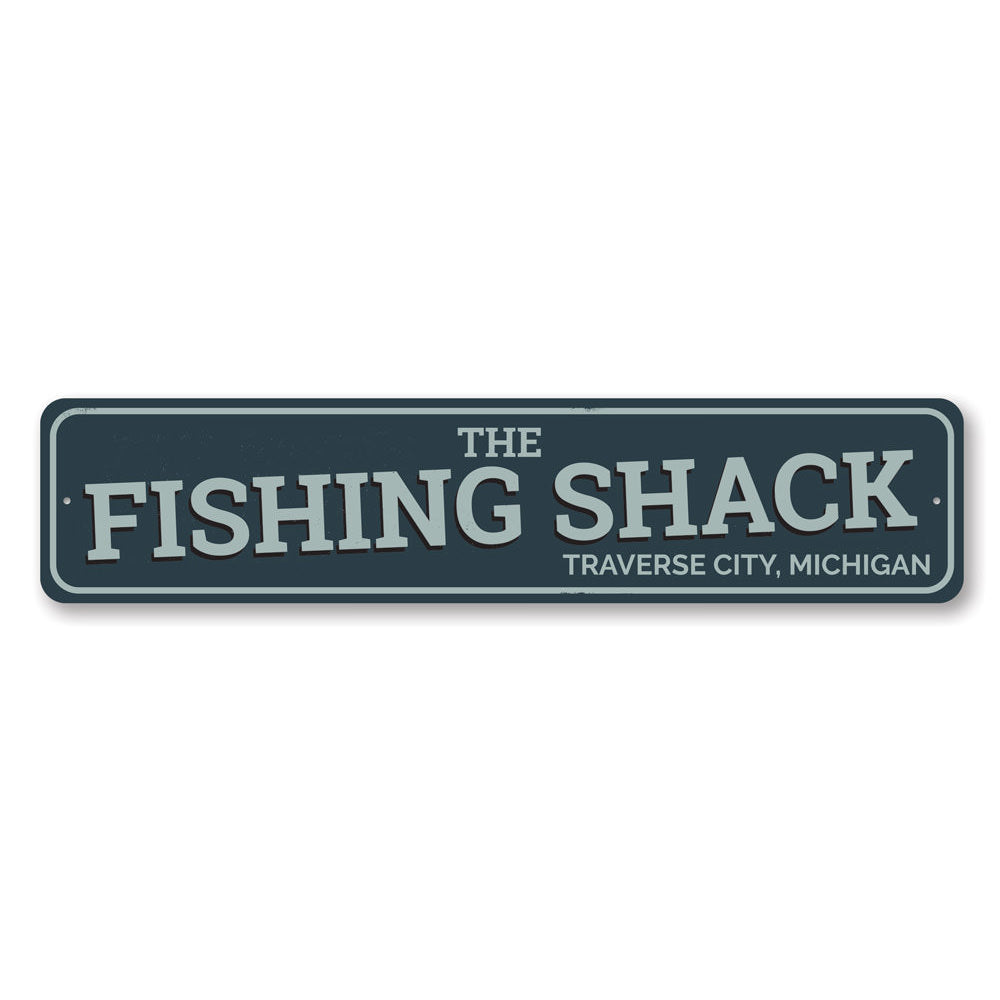 The Fishing Shack Sign, a customizable aluminum decorative sign featuring lake-themed design, perfect for lakehouses and outdoor decor.