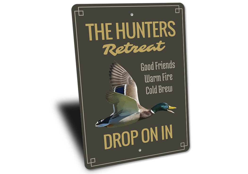 The Hunters Retreat Sign made of high-quality aluminum, featuring customizable text and pre-drilled holes for easy mounting.