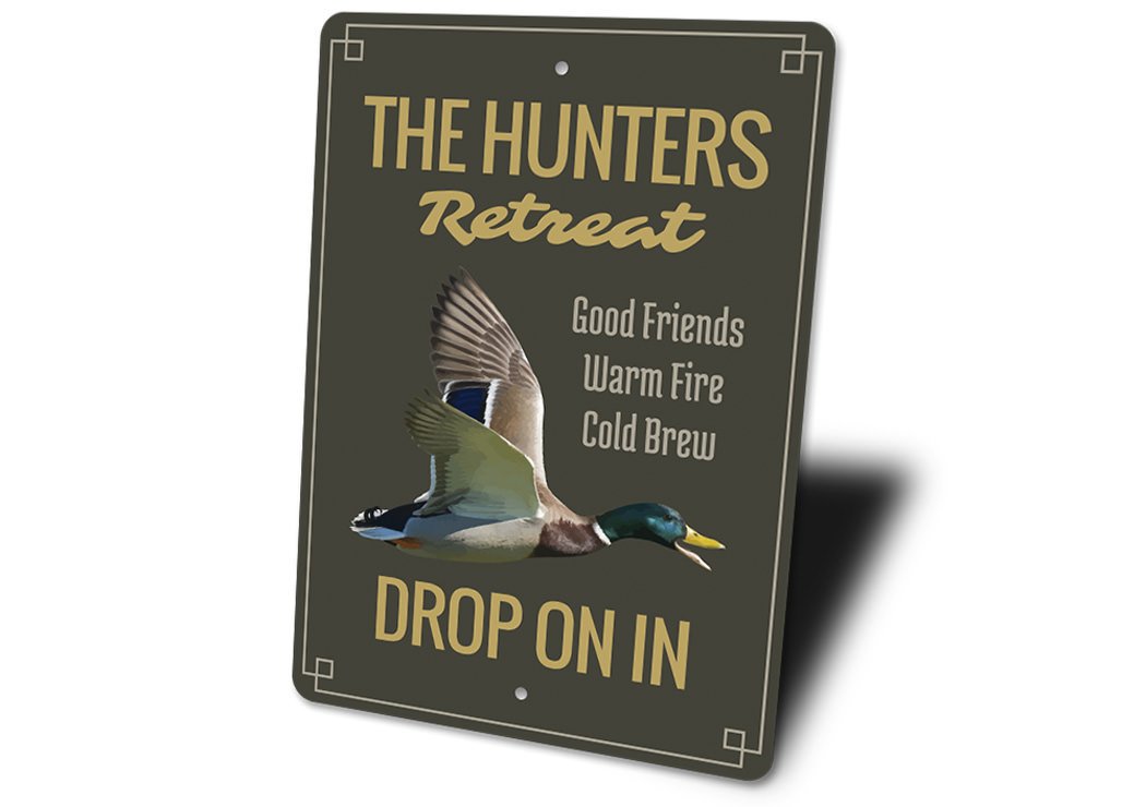 The Hunters Retreat Sign made of high-quality aluminum, featuring customizable text and pre-drilled holes for easy mounting.