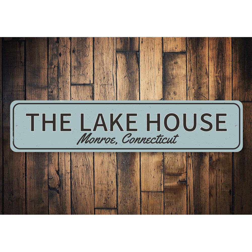 A beautifully crafted Lake House Sign made from high-quality aluminum, featuring customizable text, perfect for lakehouse decor.