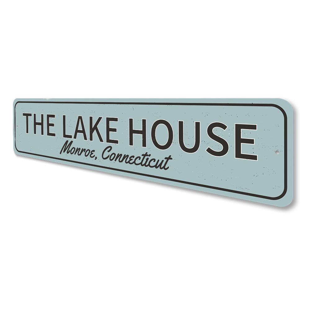 A beautifully crafted Lake House Sign made from high-quality aluminum, featuring customizable text, perfect for lakehouse decor.