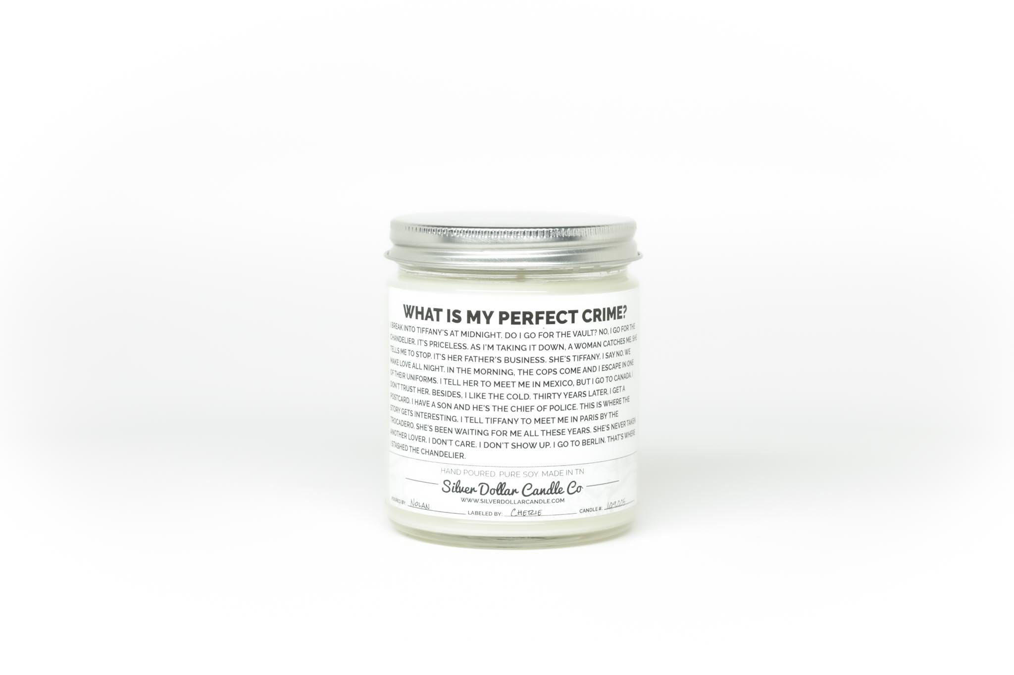 Dwight's Perfect Crime Candle featuring a humorous quote from The Office, presented in a stylish jar with a personalized lid option.