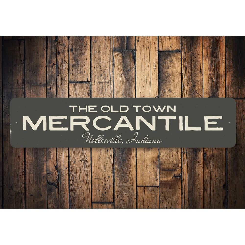 The Old Town Mercantile Sign, a customizable aluminum decorative sign featuring a rustic design, ideal for businesses and gifts.