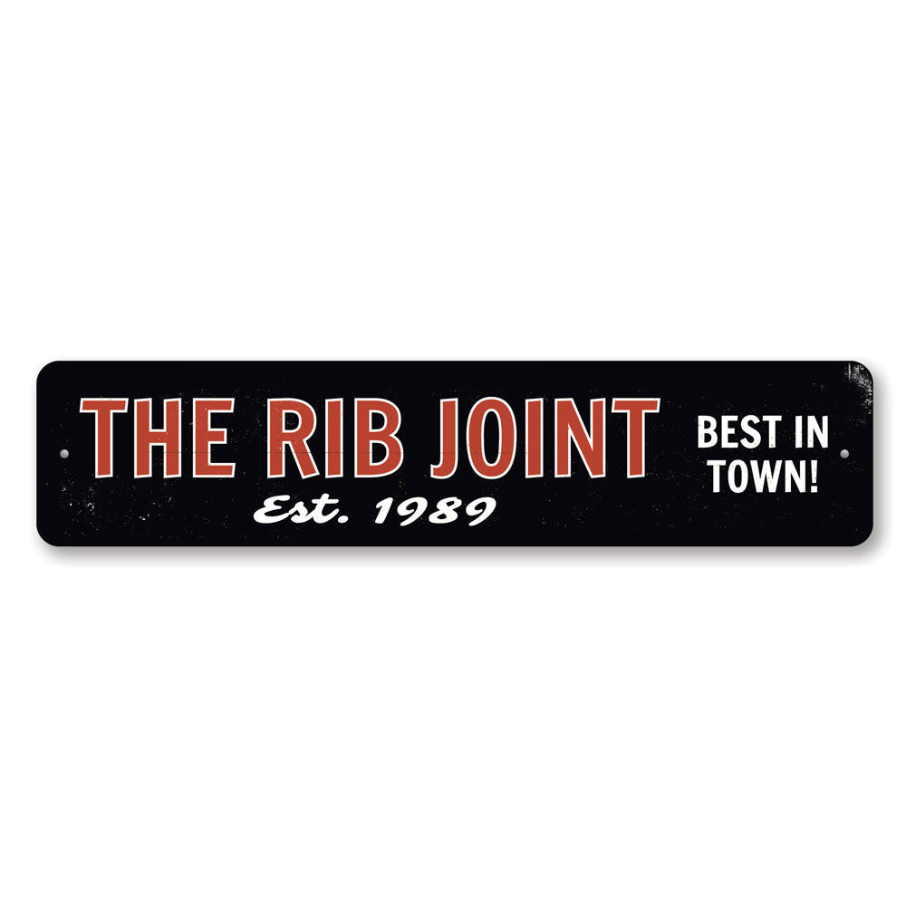 The Rib Joint Sign, a customizable aluminum wall sign featuring vibrant colors and pre-drilled holes for easy mounting.