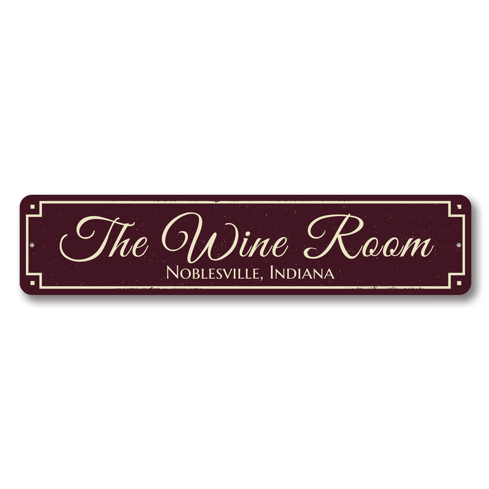 A decorative aluminum sign reading 'The Wine Room', featuring elegant typography and a rustic design, perfect for wine enthusiasts.