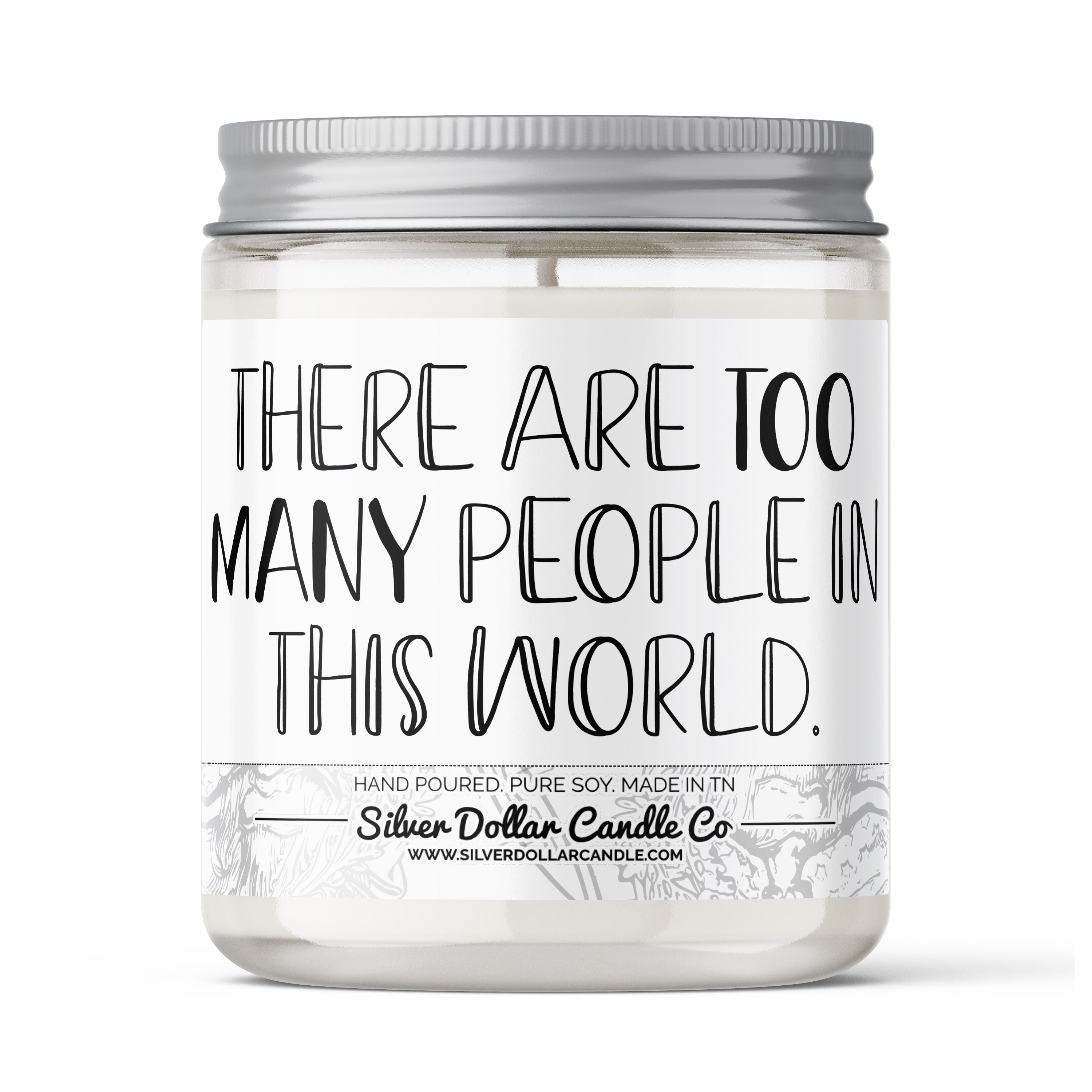 A humorous candle labeled 'There Are Too Many People In The World', showcasing its stylish design and available scents.