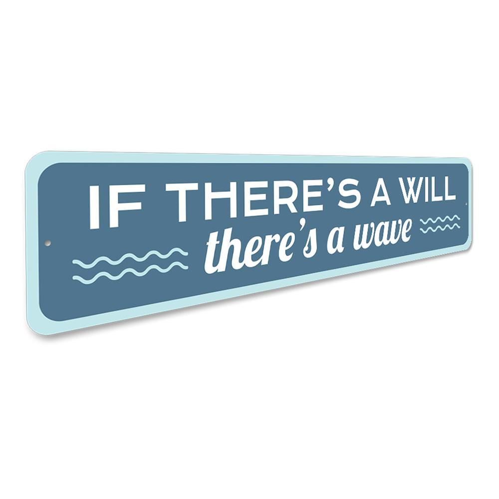 A decorative metal sign reading 'There's a Wave', featuring beach-themed design elements, perfect for coastal decor.