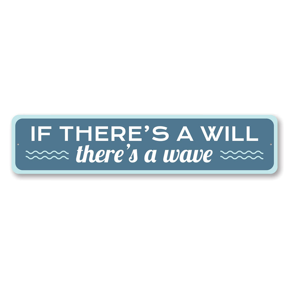 A decorative metal sign reading 'There's a Wave', featuring beach-themed design elements, perfect for coastal decor.