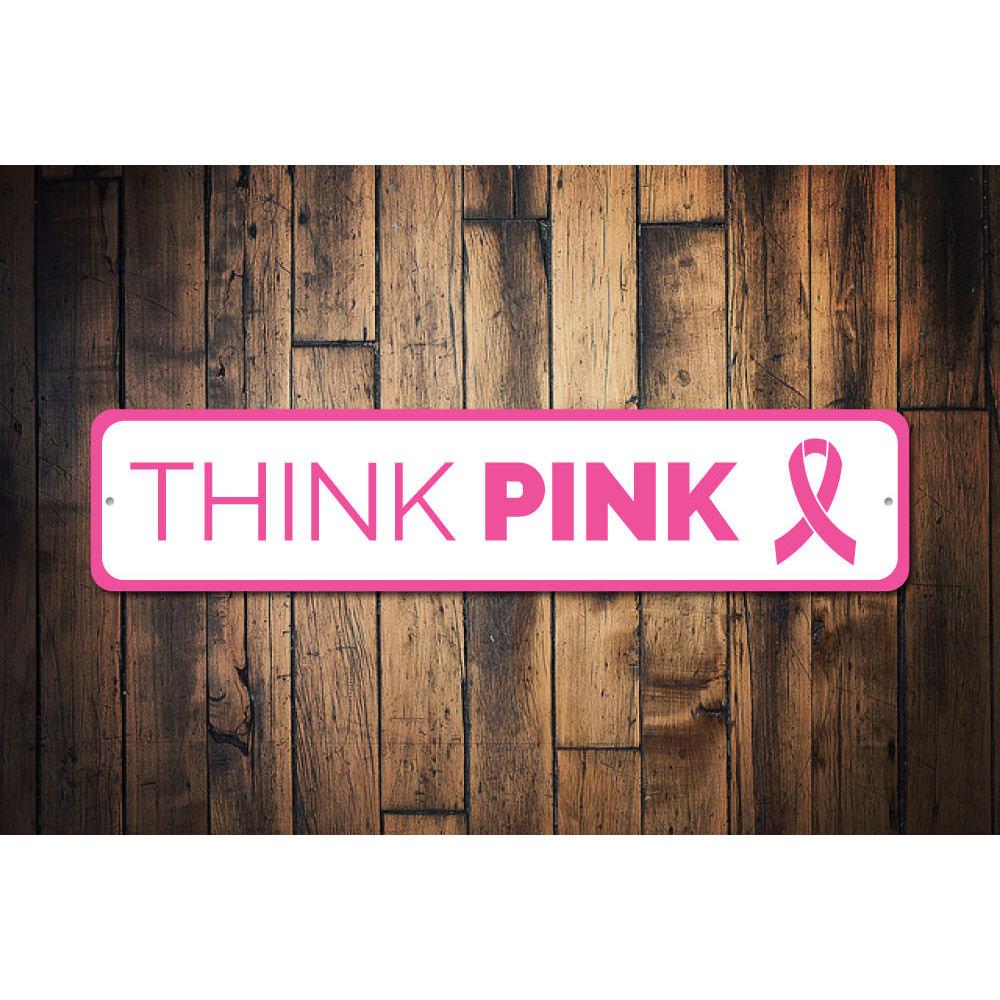 A vibrant Think Pink Sign made of high-quality aluminum, featuring customizable text, perfect for home decor.