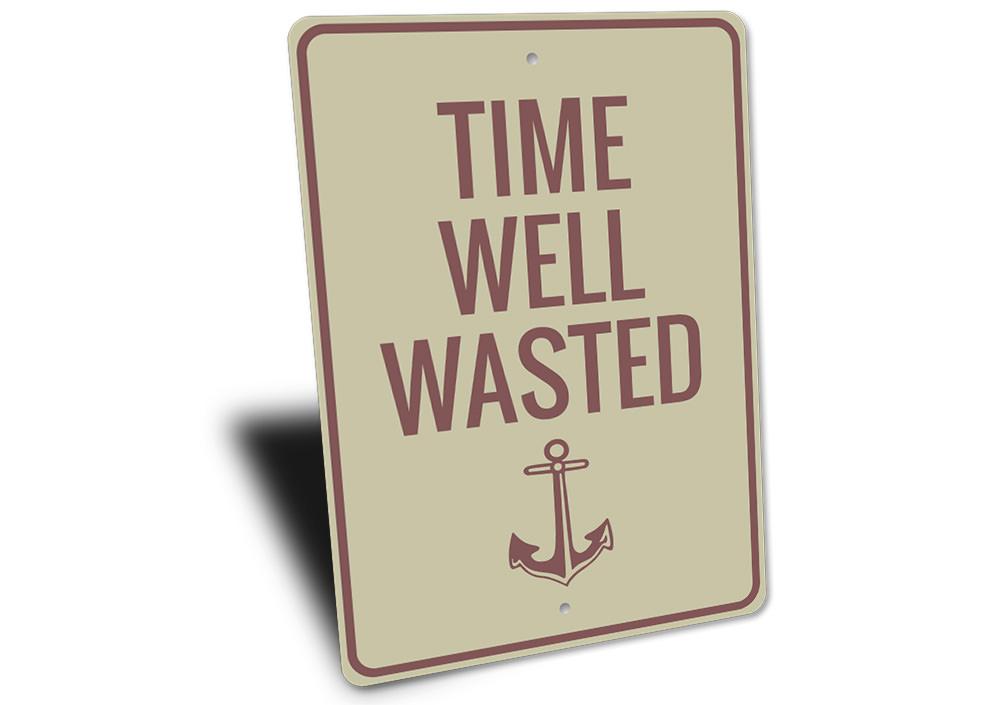 A decorative Time Well Wasted Sign made of durable aluminum, featuring a rustic design perfect for lakehouse decor.