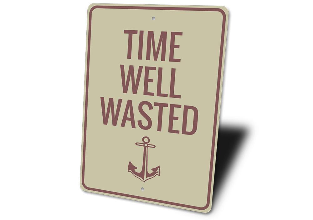 A decorative Time Well Wasted Sign made of durable aluminum, featuring a rustic design perfect for lakehouse decor.