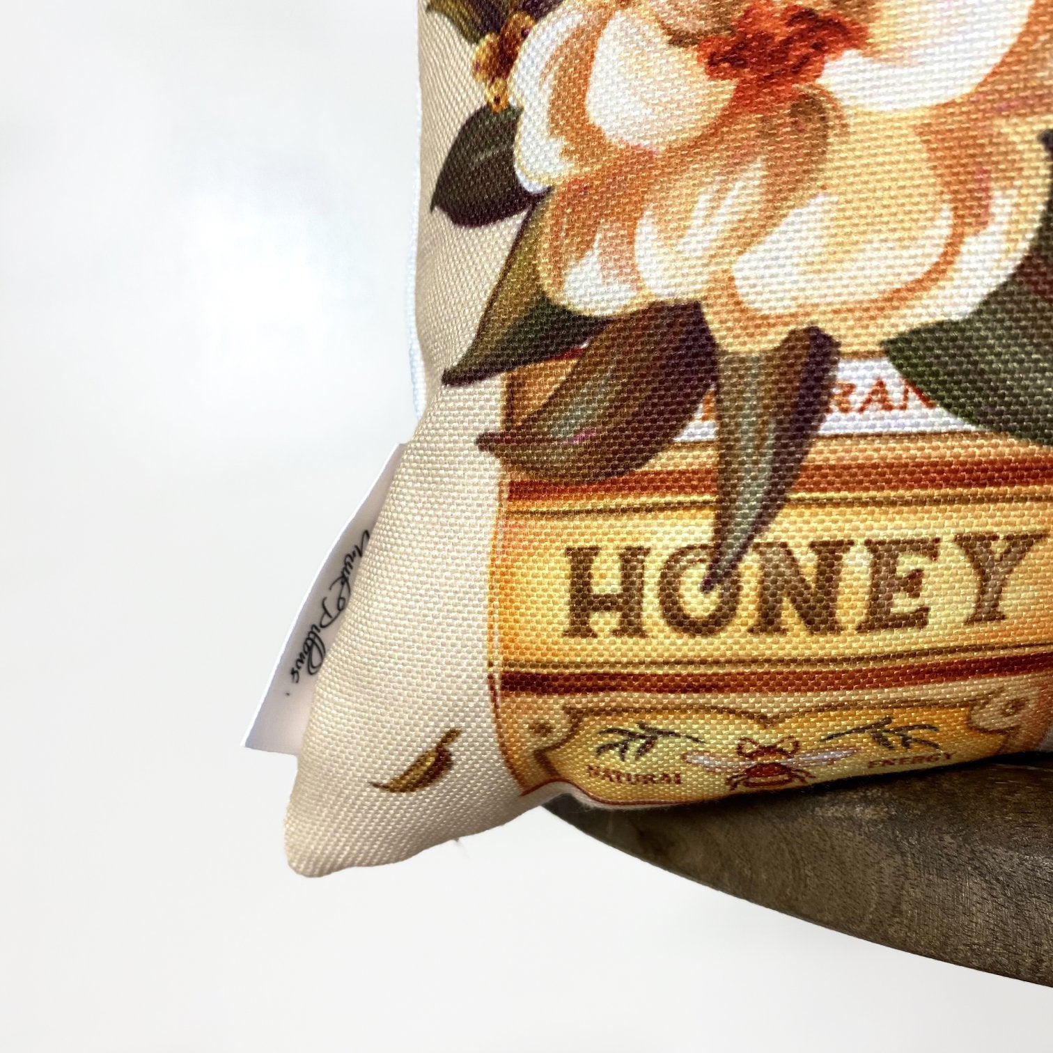 A beautifully crafted Tin Floral Arrangement pillow cover featuring vibrant watercolor flowers on a vintage tin design, with a concealed zipper.