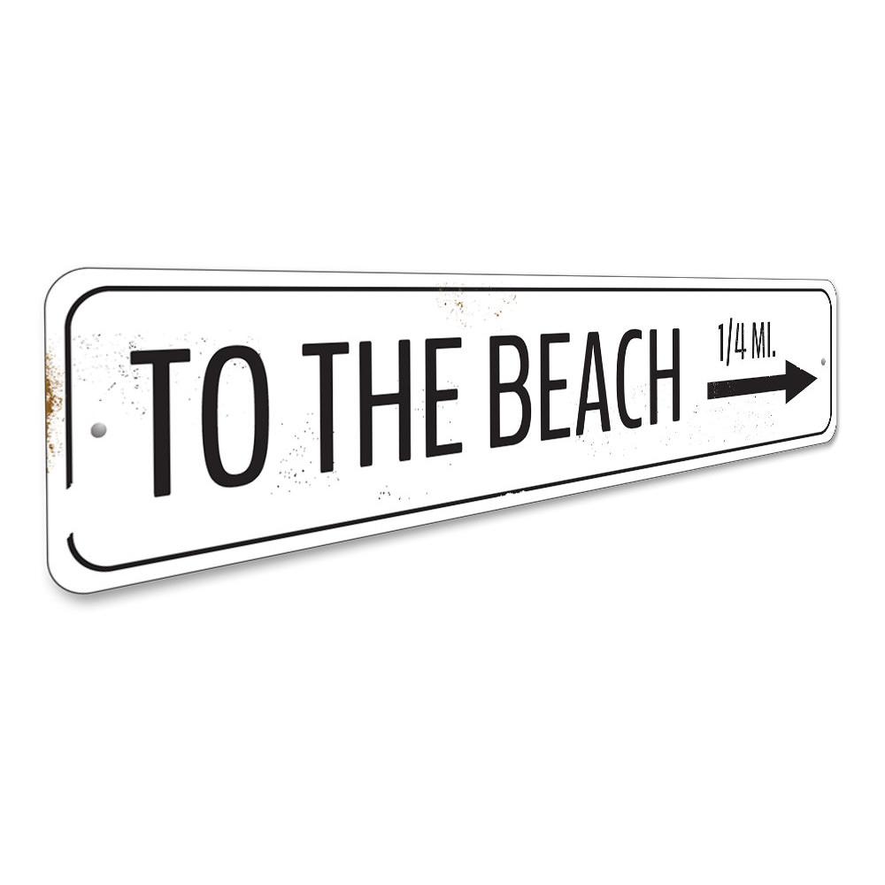 To The Beach Arrow Sign made of high-quality aluminum, featuring a vibrant design perfect for home decor.