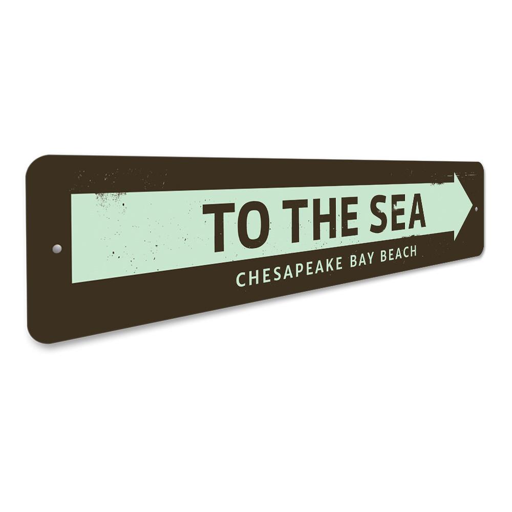 Customizable 'To the Sea' metal sign, perfect for beach-themed decor, showcasing vibrant colors and quality aluminum material.