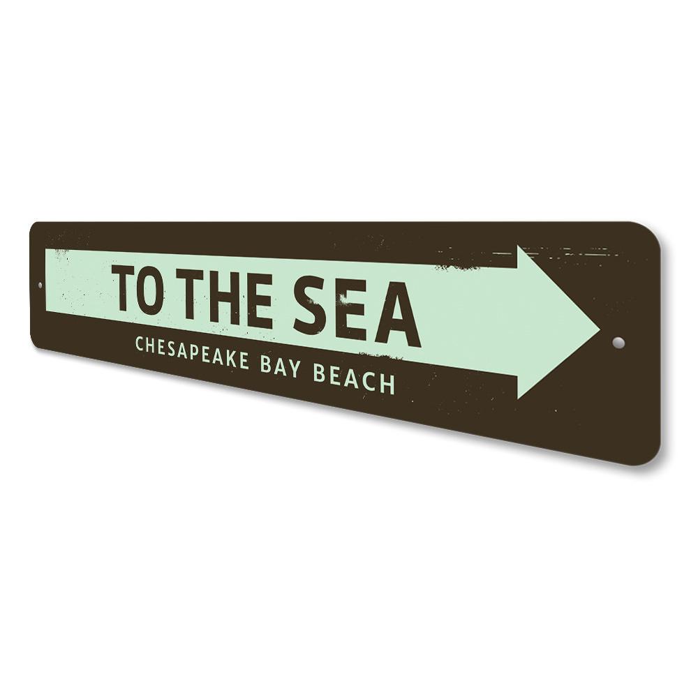 Customizable 'To the Sea' metal sign, perfect for beach-themed decor, showcasing vibrant colors and quality aluminum material.