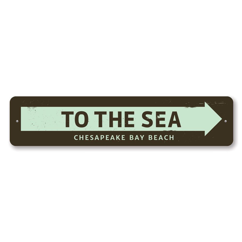 Customizable 'To the Sea' metal sign, perfect for beach-themed decor, showcasing vibrant colors and quality aluminum material.