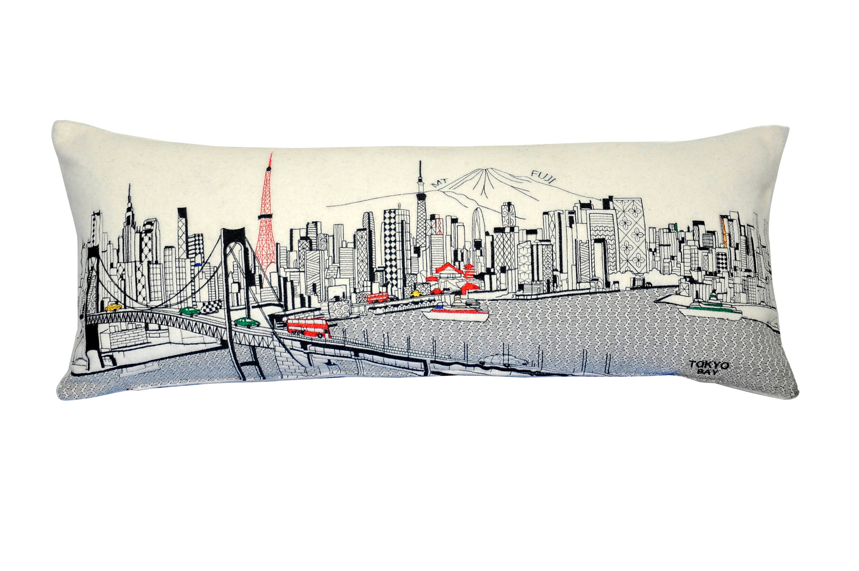 Tokyo Pillow featuring iconic landmarks like the Rainbow Bridge and Imperial Palace, designed with vibrant colors and a red zipper.