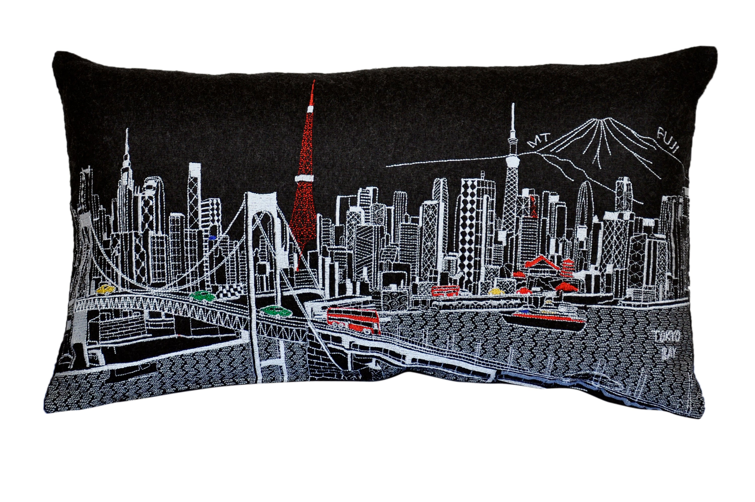 Tokyo Pillow featuring iconic landmarks like the Rainbow Bridge and Imperial Palace, designed with vibrant colors and a red zipper.