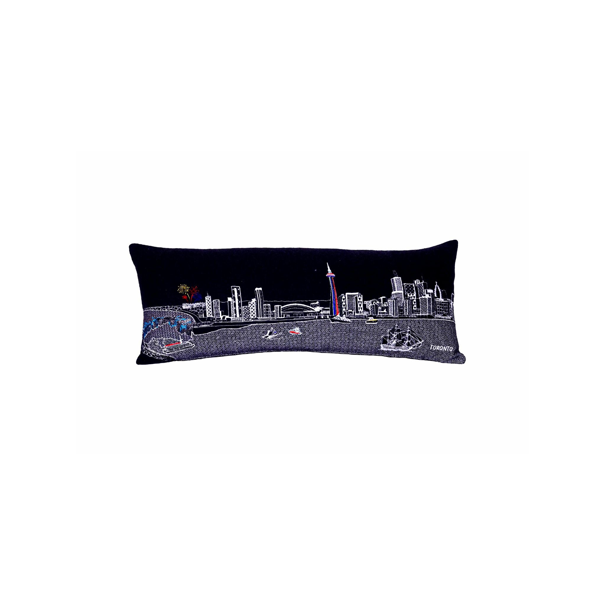 Toronto Pillow featuring the skyline and Niagara Falls, showcasing iconic landmarks in vibrant colors.