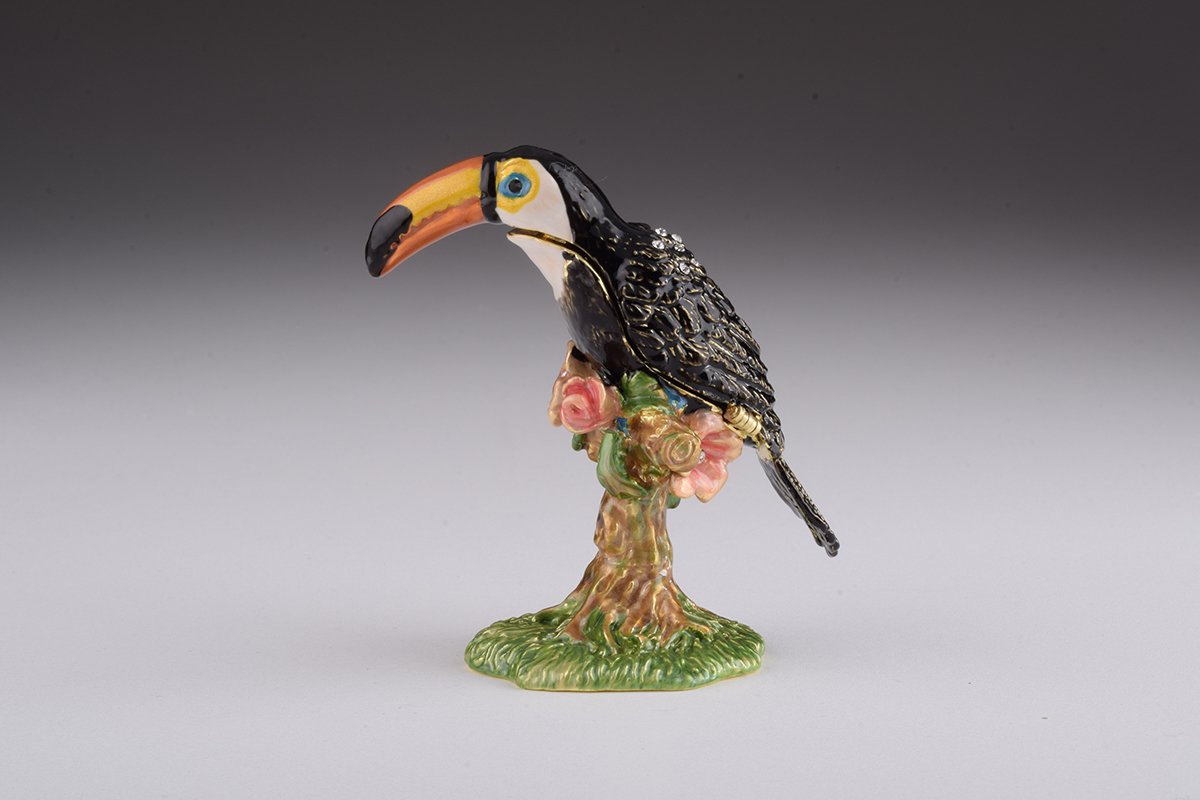 Handcrafted Toucan Bird trinket box with Austrian crystals and 24K gold plating, showcasing intricate enamel work.