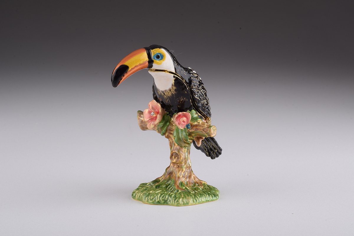 Handcrafted Toucan Bird trinket box with Austrian crystals and 24K gold plating, showcasing intricate enamel work.