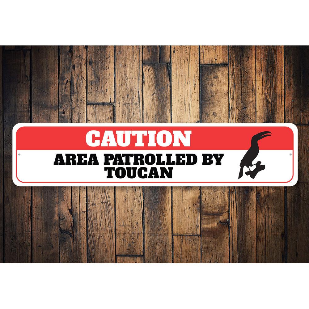 Toucan Caution Sign made of durable aluminum, featuring vibrant colors and a unique design, perfect for indoor or outdoor decoration.