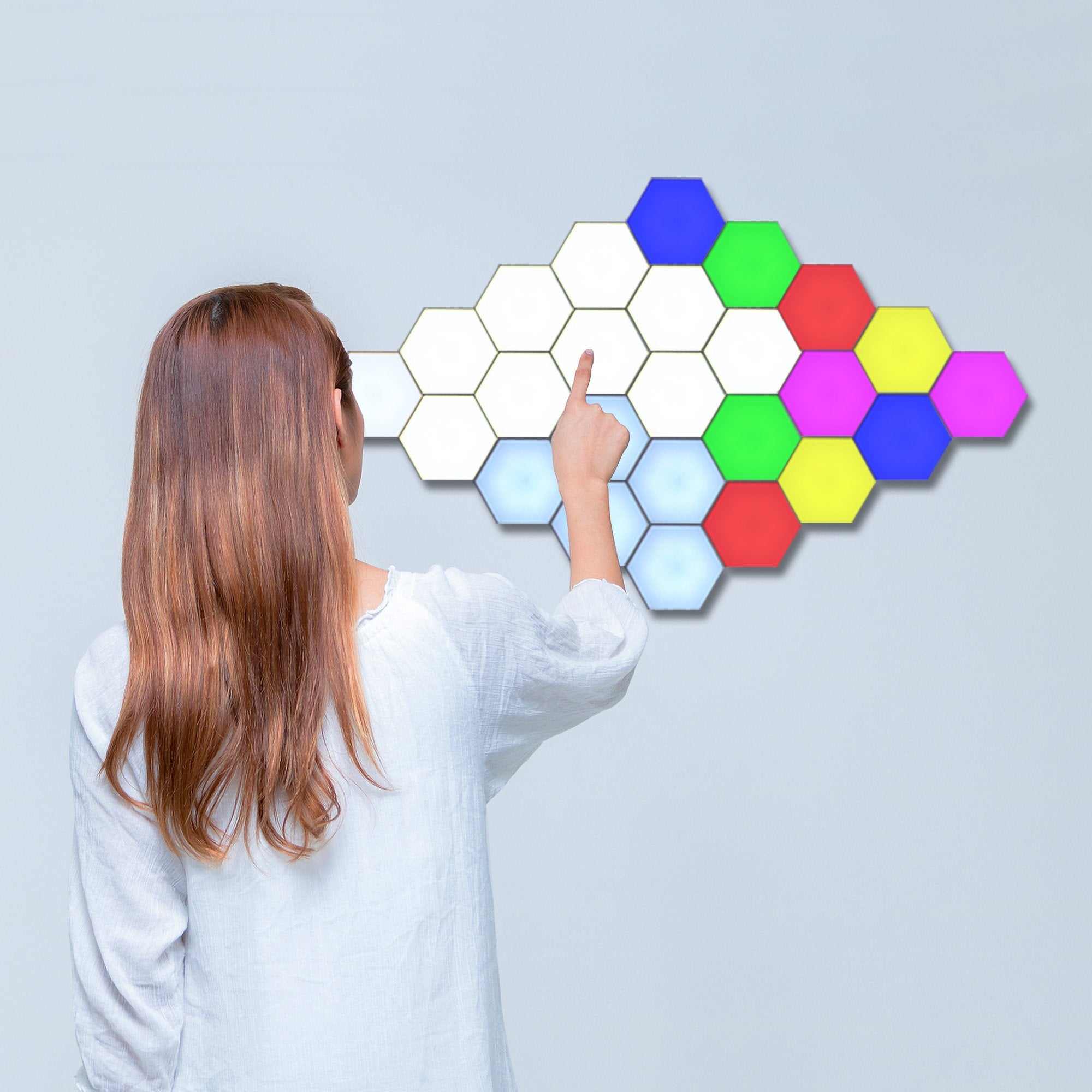 Touch Sensitive Modular Wall Lights featuring multiple colorful tiles arranged on a wall, showcasing their modular design and touch control feature.